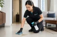 KleanSG cleaner treating a pet stain on a home floor in Singapore